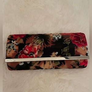 Floral clutch. Brand new never been used.
